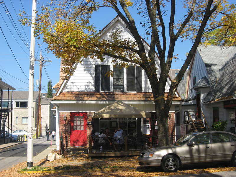 Front of the house (now a restaurant) at 413 E. Fourth Street in Bloomington, Indiana, United States.  Built in 1907, it is part of the locally-designated Restaurant Row Study Area.