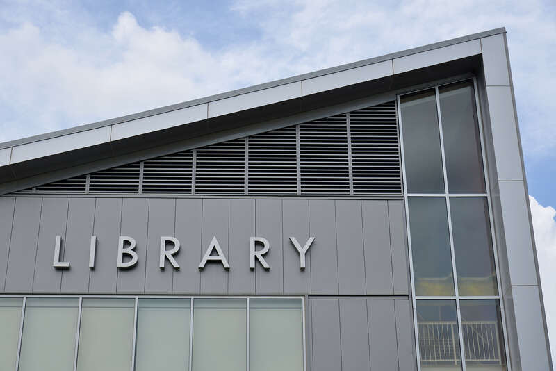 The corner of Gaithersburg Library has a very distinctive roof line and the word Library is written in large letters.  18330 Montgomery Village Avenue, Gaithersburg, Maryland 20879.