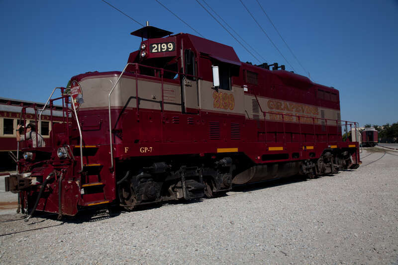 Grapevine Vintage Railroad No. 2199, also known as 'Vinny' is a 1953 EMD GP7u diesel locomotive. Originally owned by the Atchison, Topeka, and Santa Fe Railroad, it was purchased by the Grapevine Vintage Railroad (GVRR) in Grapevine, Texas in 2005