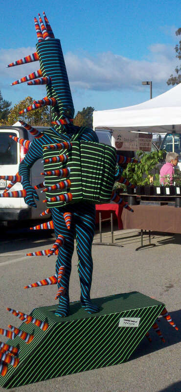 The Great Morgani performing in his &quot;Leaning Tower of Squeeza&quot; costume.