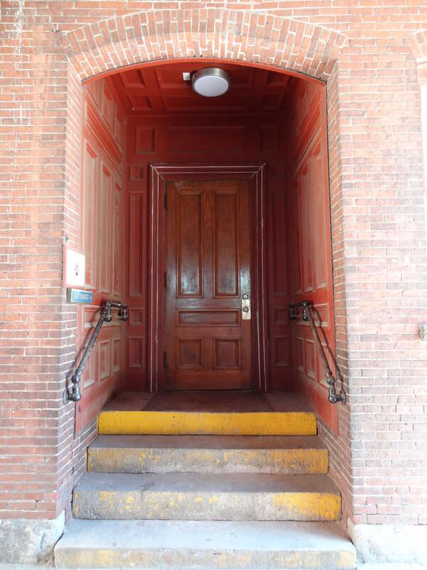 The west side entrance of Hamilton Mill, located near 165 Jackson Street, Lowell, Massachusetts.