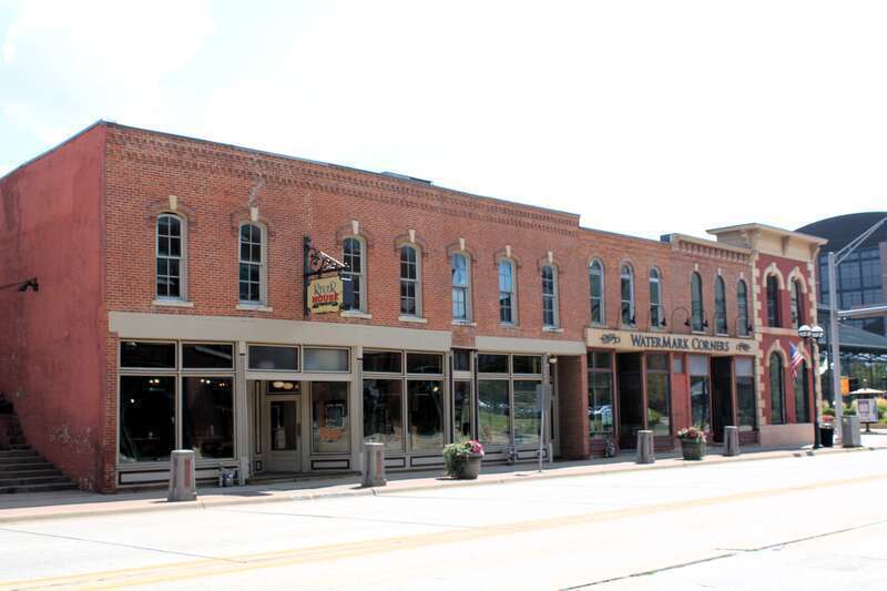 Historic Block in Downtown Moline, Illinois. This group of Italianate commercial buildings were built between 1876 and 1885. The building on the corner was originally three stories, but the third floor was removed after a fire in the 1960s.