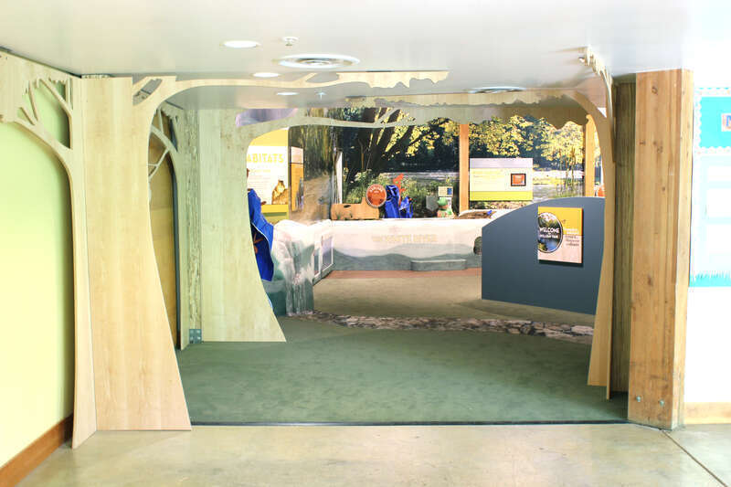 Holliday Park Nature Center. Exhibits designed and built by Taylor Studios, Inc. 
Indianapolis, IN
Overview of exhibit gallery with large photographic murals, crawl-through exhibit base, nature theming and water table.

www.taylorstudios.com