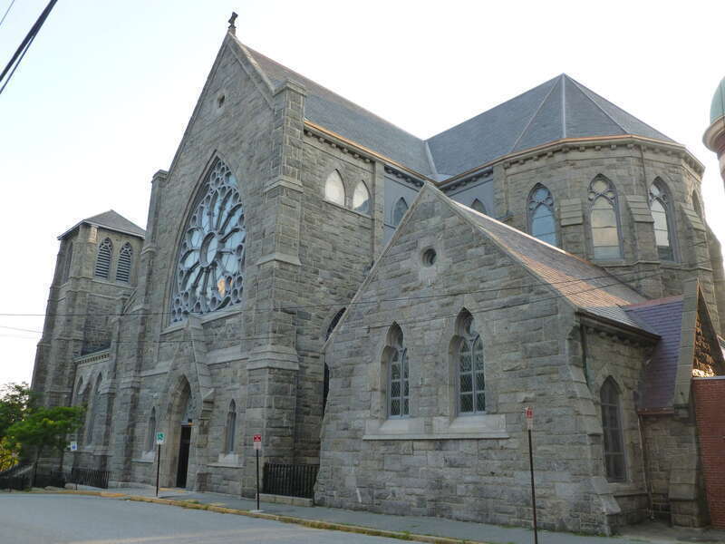 Immaculate Conception Church, a Roman Catholic Church located at 144 East Merrimack Street, Lowell, Massachusetts.  East side of building shown.
