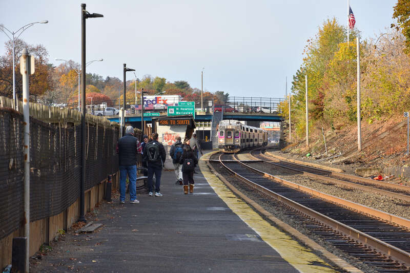 An inbound  Framingham/Worcester line train arrives at Newtonville in November 2023
