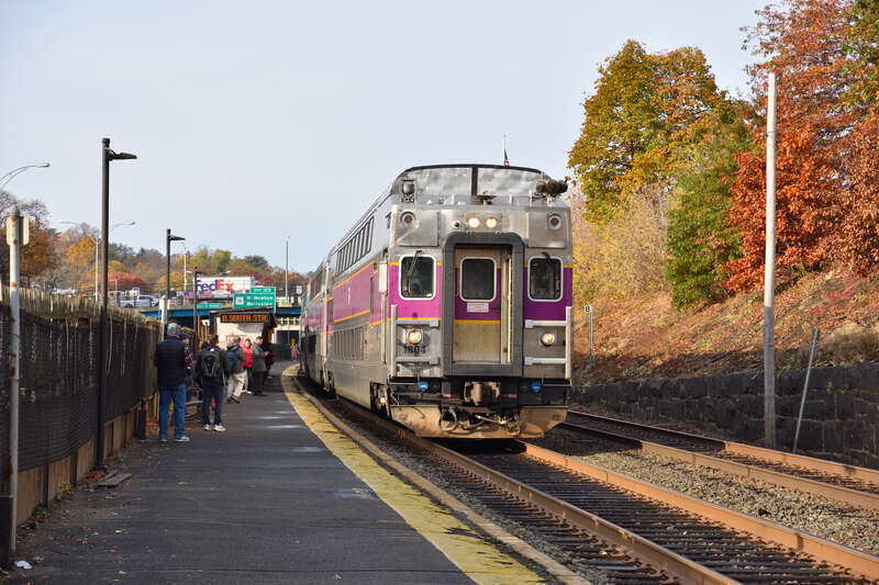 An inbound Framingham/Worcester line train arrives at Newtonville in November 2023