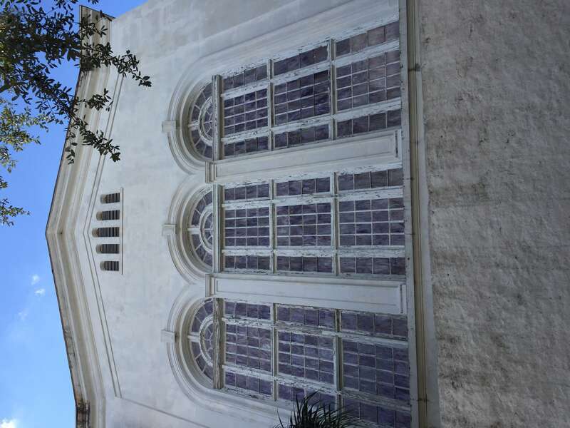 This is an outside view of the stained glass windows of the Karpeles Manuscript Library Museum in the Springfield neighborhood of Jacksonville, Florida.