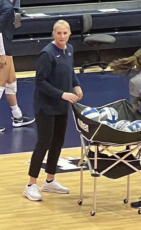 Katie Schumacher-Cawley, head volleyball coach at Penn State; practicing with the team before its match against Illinois on Oct. 26, 2022, at Huff Hall in Champaign, IL.