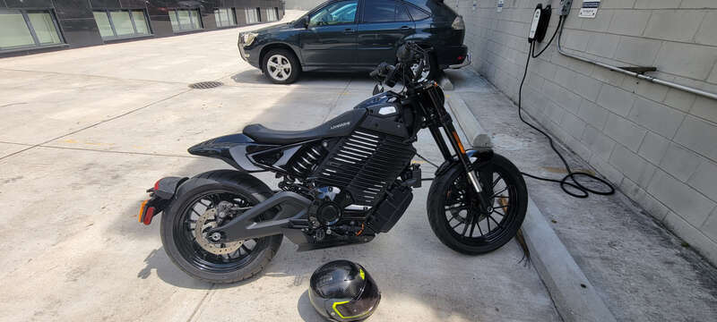 Electric motorcycle charging in Brooklyn, New York