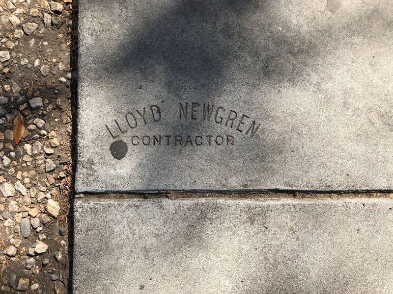 Sidewalk stamp by Lloyd Newgren Contractor on North 2nd Street in San Jose, California, United States.