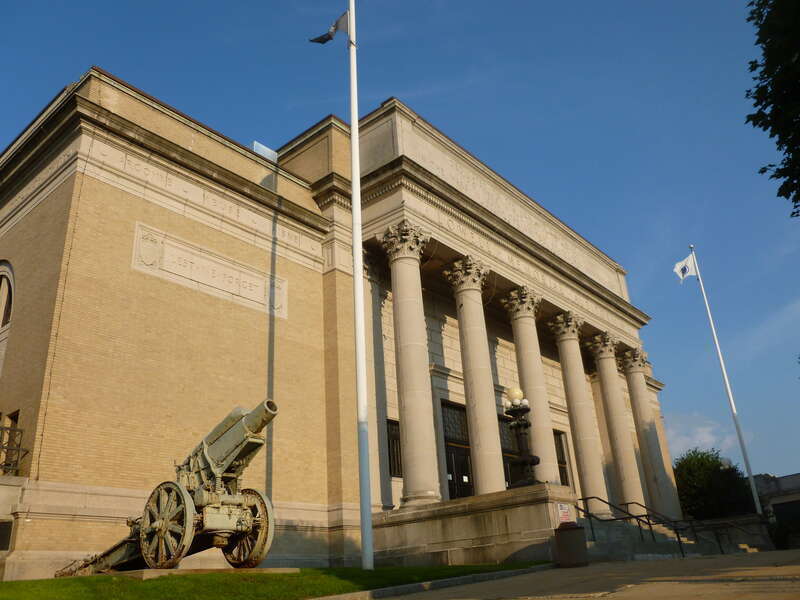 Lowell Memorial Auditorium, located at 50 East Merrimack Street, Lowell, Massachusetts.  North and west (front) sides of building shown.