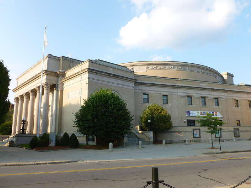 Lowell Memorial Auditorium, located at 50 East Merrimack Street, Lowell, Massachusetts.  North and west (front) sides of building shown.