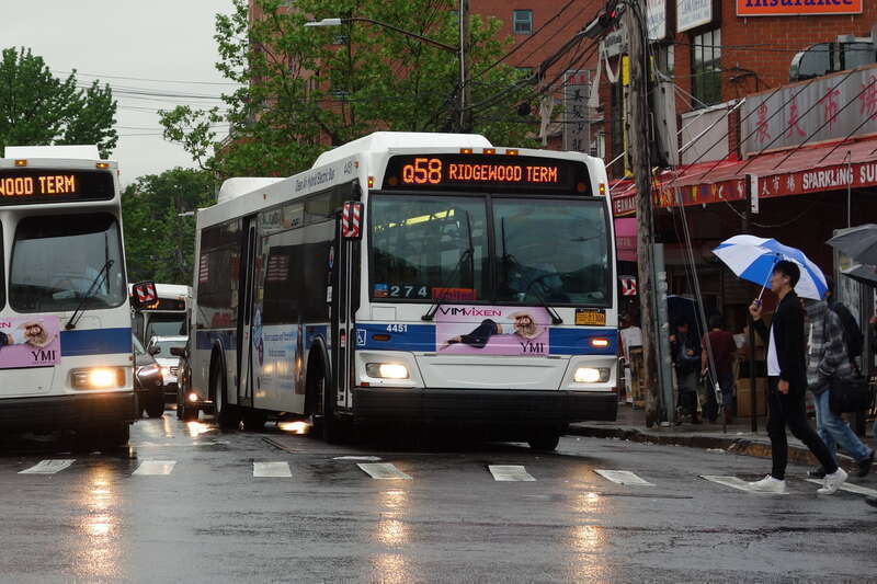 A Ridgewood Terminal-bound Q58 Limited bus entering service at the route's terminus at Main Street and 41st Road in Downtown Flushing, Queens.
