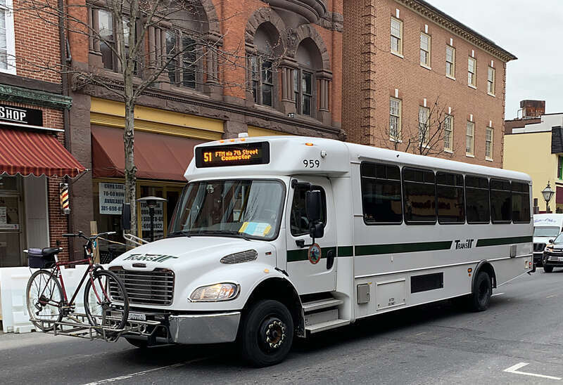 Large cutaway van 959 outbound on Market Street in 2021.