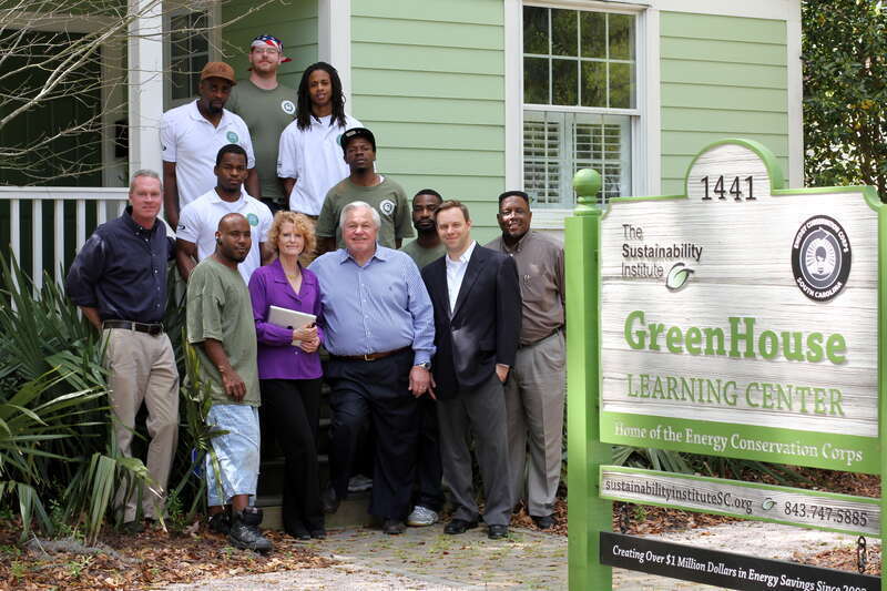 North Charleston Mayor R. Keith Summey visits with the Sustainability Institute's Energy Conservation Corps at their Green House on East Montague.

Photo by Ryan Johnson