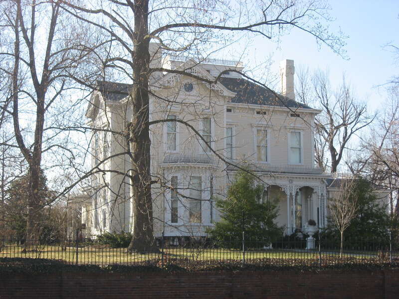 Front and eastern side of the Medley House, located at 1220 Frederica Street (Kentucky Route 2831) in Owensboro, Kentucky, United States.  Built in 1883, it is listed on the National Register of Historic Places.