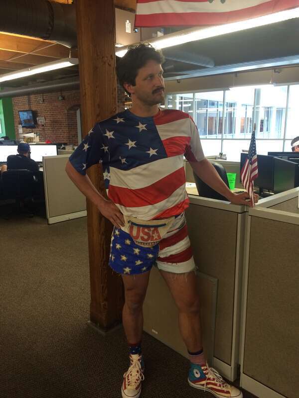 Coyote Logistics employee Clay Hicks standing in solemn contemplation