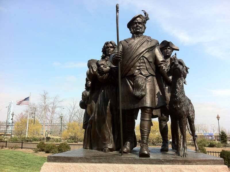 Monument to Scottish Immigrants, Philadelphia, Pa.
This is a Monument to Scottish Immigrants. The Monument is on a granite base 4' High, 6' long by 6' deep. It was designed by Sculptor Terry Jones. It depicts a Scottish Family led by the Patriarch of