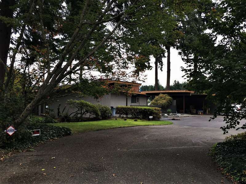 Herbert and Barbara Munson House  Property is located well off Gravelly Lake Drive at the end of a narrow lane.  This is best view due to conspicuous 'No Trespassing' signs.