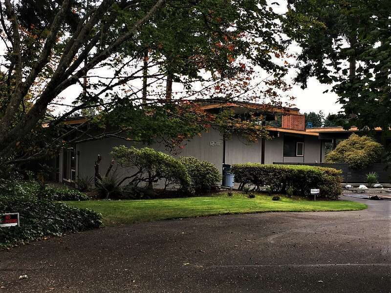 Herbert and Barbara Munson House Property is located well off Gravelly Lake Drive at the end of a narrow lane.  This is best view due to conspicuous 'No Trespassing' signs.