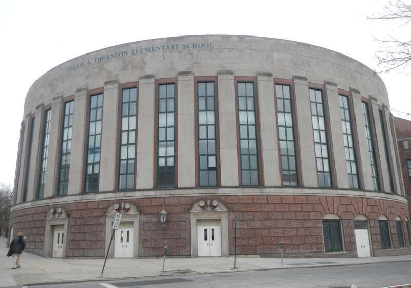Looking south across East 2nd Street at school, formerly Washington Jr High, on a gloomy afternoon.