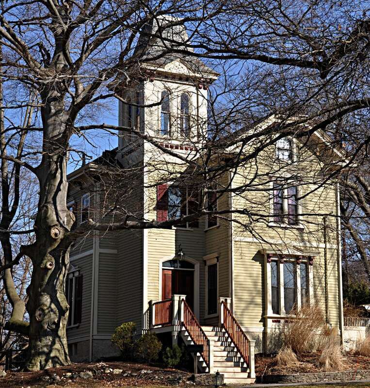A photograph of the historic House at 230 Winchester Street in Newton, Massachusetts.