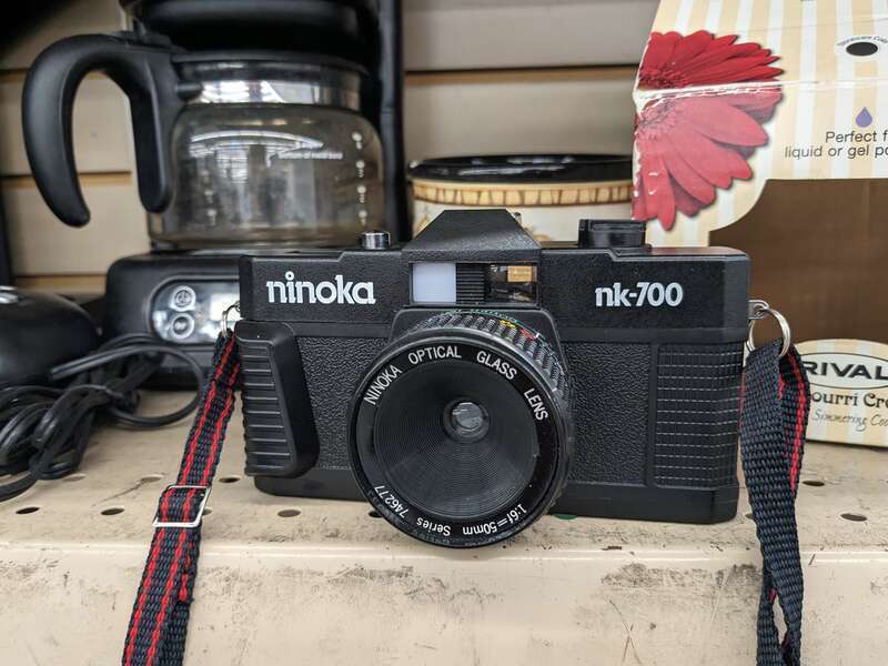 A Ninoka NK-700 film camera, on sale at a Goodwill thrift store