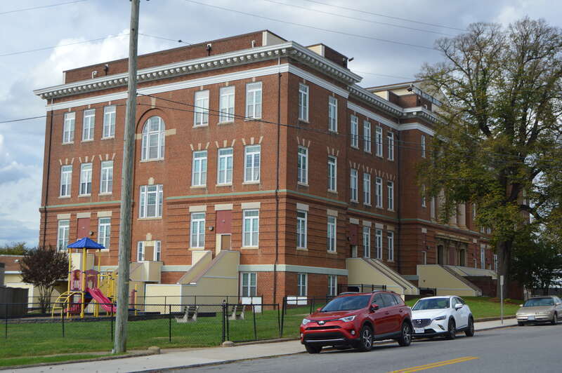 Southern side and front of the former E.C. Glass High School (now apartments), located at 1301 Park Avenue in Lynchburg, Virginia, United States.  It was built in 1910.