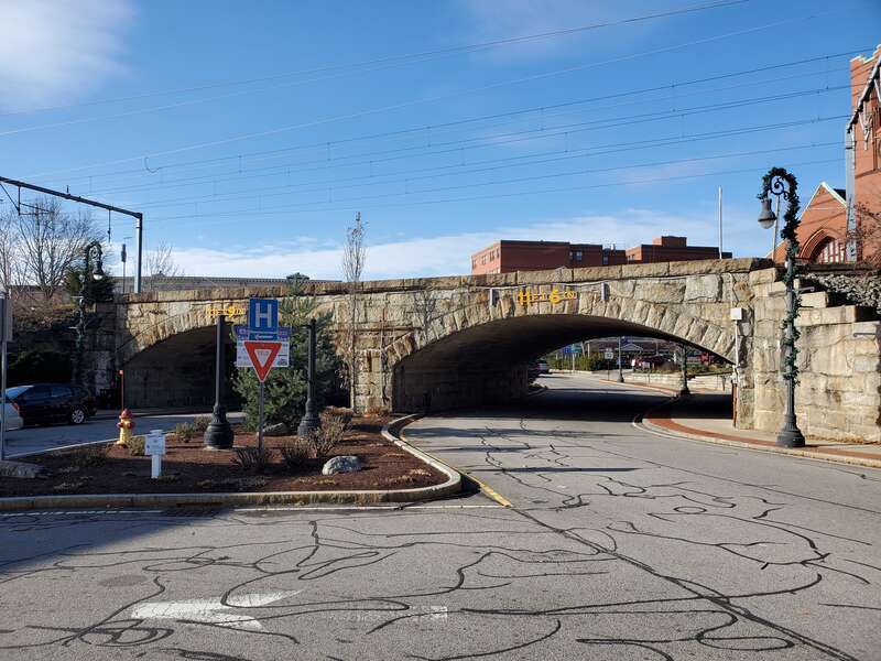 Double-arch bridge carrying the Northeast Corridor over Park Street in Attleboro, Massachusetts, seen in December 2022