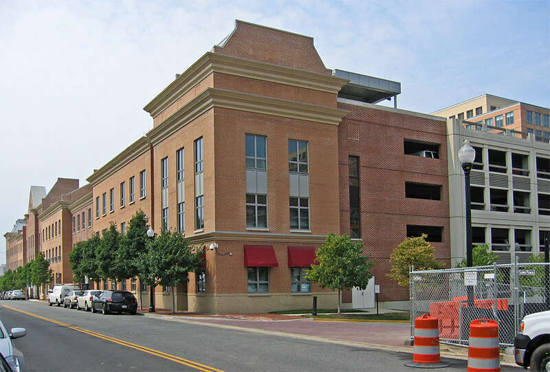 Town houses line the back side of the parking garages for the Patent and Trademark Offices in the Carlyle Development in Alexandria.
This work is licensed under a 
Creative Commons Attribution 3.0 United States License

Please Attribute to: Brett VA
