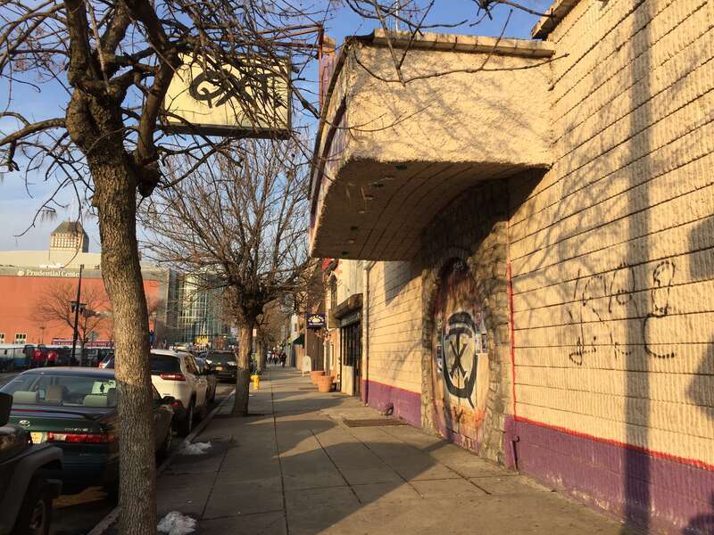 QXT's nightclub front doors in Newark New Jersey, USA. The Prudential Center is in the background.