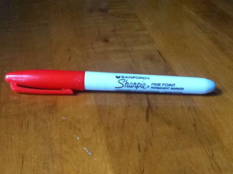 A fine-point, red sharpie.