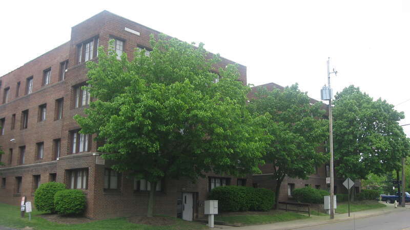 Eastern front of the Rhodes and Watters Apartment Buildings, located at 608-612 W. Market Street (State Route 18) in Akron, Ohio, United States.  Built in 1912, they are listed on the National Register of Historic Places.