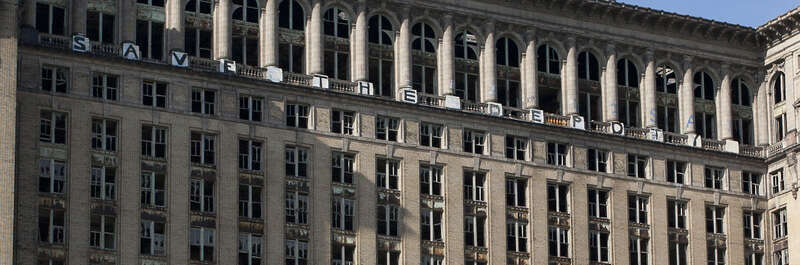 The abandoned Michigan Central Train Station, as seen from Roosevelt Park in Detroit. Note the &quot;Save the Depot&quot; sign on the top of the building.