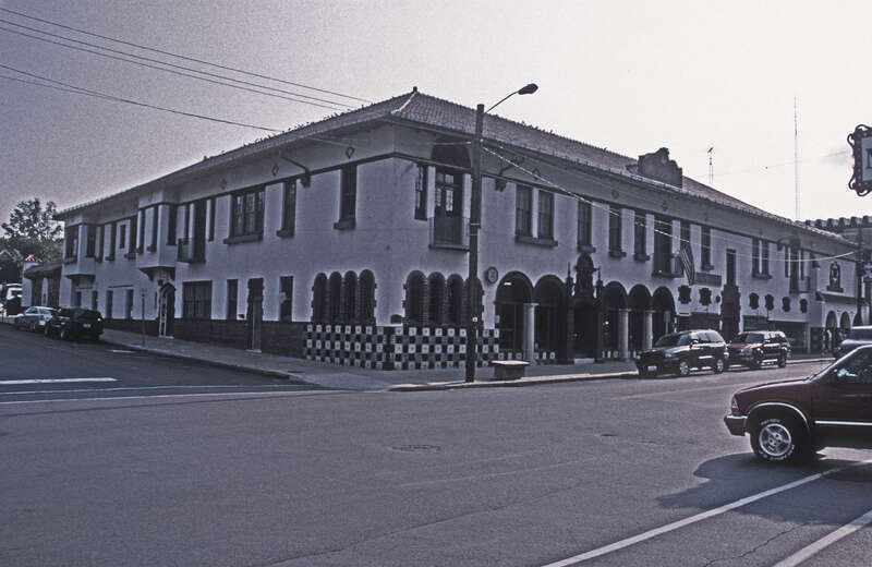 SOUTHEAST MISSOURIAN NEWSPAPER BUILDING WITH CERAMIC MURALS WHICH DEPICT THE HISTORY OF PRINTING AND THE DISSEMINATION OF NEWS.