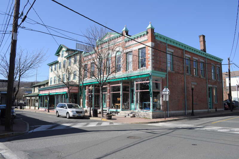 The (multi-building) Seymour Antiques Co. on Bank Street, Seymour, Connecticut. The building at right is Beach's Block, built 1890. Part of the Downtown Seymour Historic District, which is listed on the National Register of Historic Places.