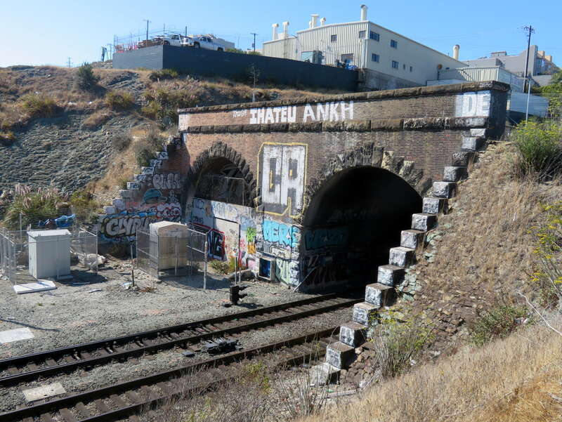 The south portal of Bayshore Cutoff Tunnel #2 in August 2018, with the never-used second bore visible.