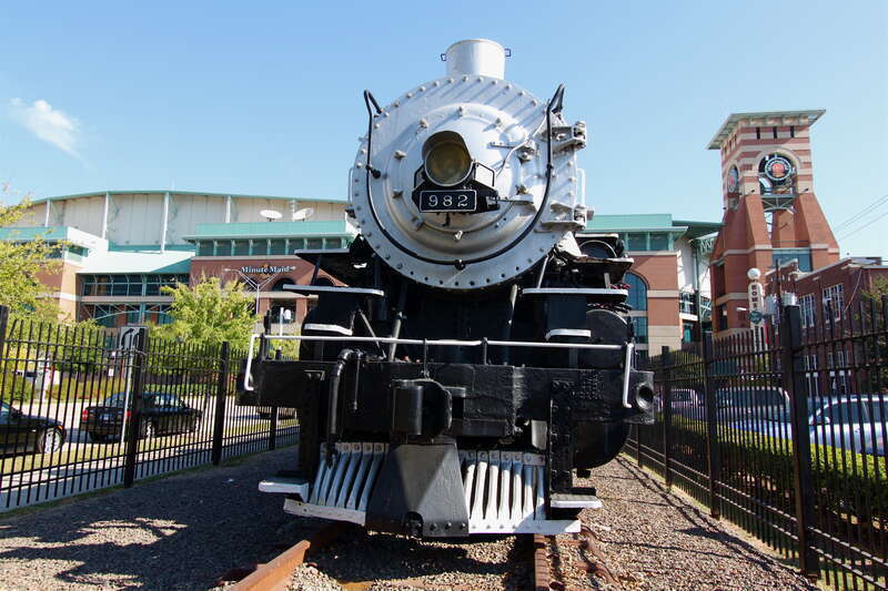 Minute Maid Field, the retractable dome stadium that is the home of the Houston Astros, was built to incorporate old Union Station.  When an Astro homers, a 4-4-0 locomotive steams along a short section of track above the 'Crawford Boxes'.