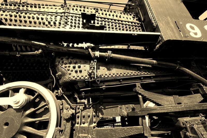 Firebox of a Texas class steam engine on display outside Minute Maid field in Houston TX.  Sepia-tone image.