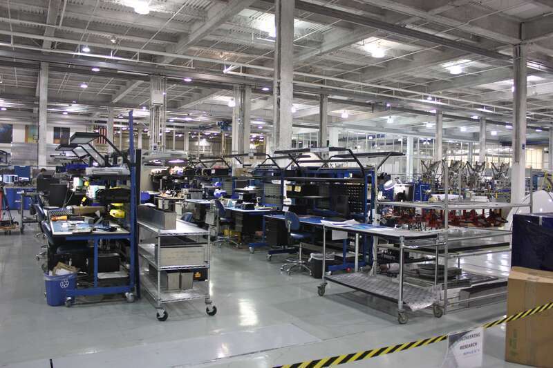 Component assembly and testing stations at the SpaceX rocket factory in Hawthorne, California.
