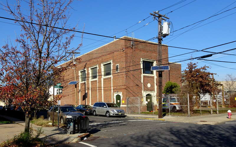 Looking north across Orient&amp;amp;Evergreen at substation on a sunny late morning