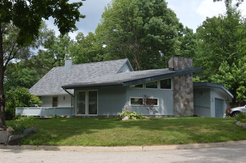 One of the houses facing the cul-de-sac at the end of Sumac Drive in West Lafayette, Indiana, United States.  Like the rest of the neighborhood, this house is part of the Happy Hollow Heights Historic District, a historic district that is listed on