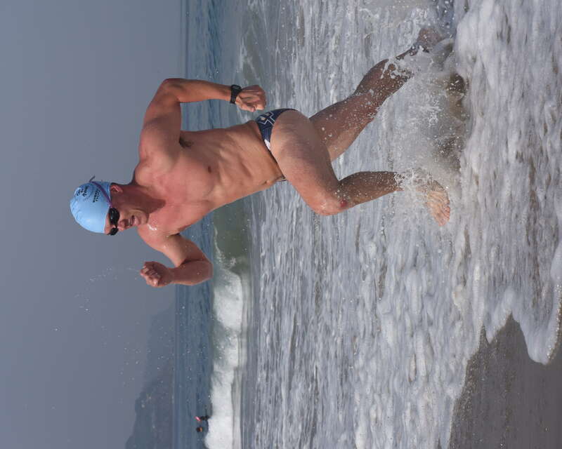 A man explodes from the water after swimming the Second Annual Redondo Beach Open Water Swim held on Sunday, July 14, 2019.

VFJ_0314_cr