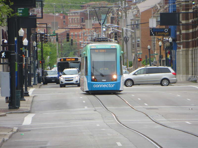 Telephoto view of a streetcar on the Cincinnati Bell Connector system, on Walnut Street near Central Parkway