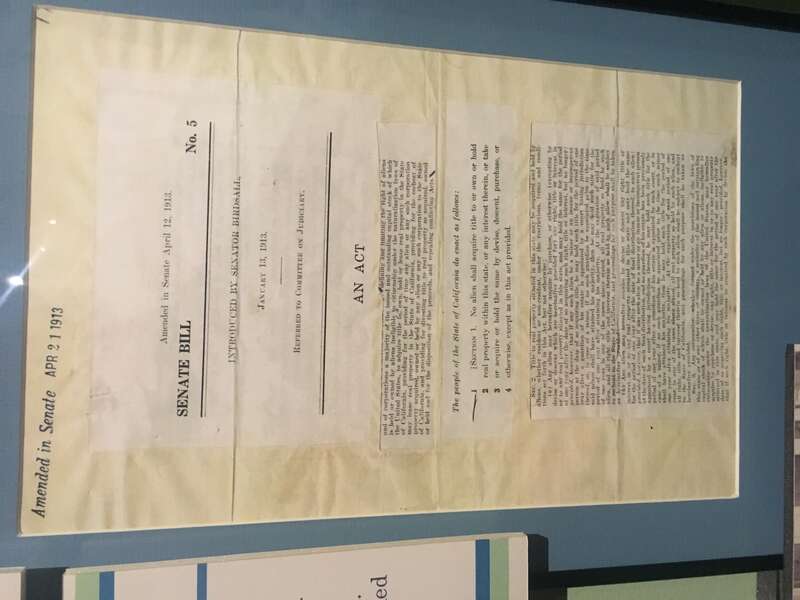 A copy of the state Alien Land Law, that barred asian immigrants from buying land, on display from the CA State Archives, as part of the &quot;Uprooted! Japanese Americans During WWII&quot; exhibit on the first floor of the The California Museum.