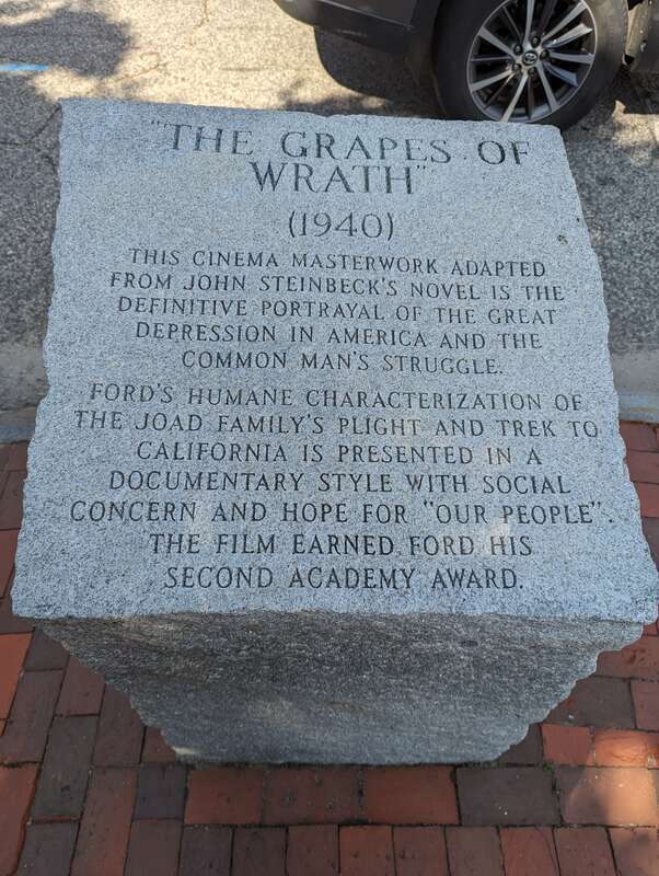 Stone inscription for &quot;The Grapes of Wrath&quot; (1940) at John Ford's statue in Portland, Maine