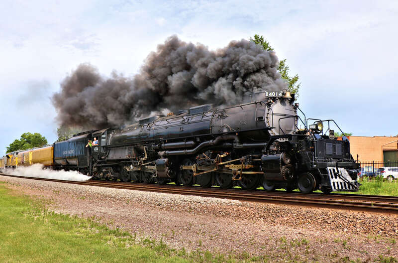 Union Pacific 4014 &quot;Big Boy&quot; (Alco 4-8-8-4) is Eastbound on the UP Clinton Sub seen here at the Kellogg Avenue Crossing North of Gilchrist Street in Ames, Iowa.
Car/Power List:
4014 - Alco 4-8-8-4
814 - Joe Jordan
809 - Jim Adams
3025 -