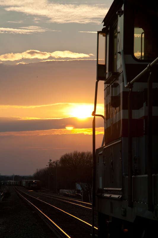 A VA Railway Express GP40 pauses in Manassas, VA as the sun sets.