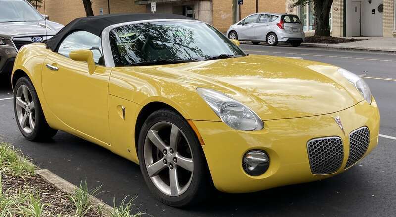 Another front view of a yellow Pontiac Solstice