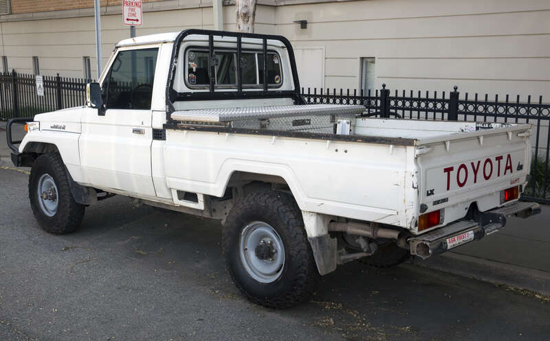 A 1997 Toyota Land Cruiser LX pickup (FZJ75) in Jersey City. GCC market car, 1FZ-F carbureted 4.5-litre inline-six and a five-speed manual.